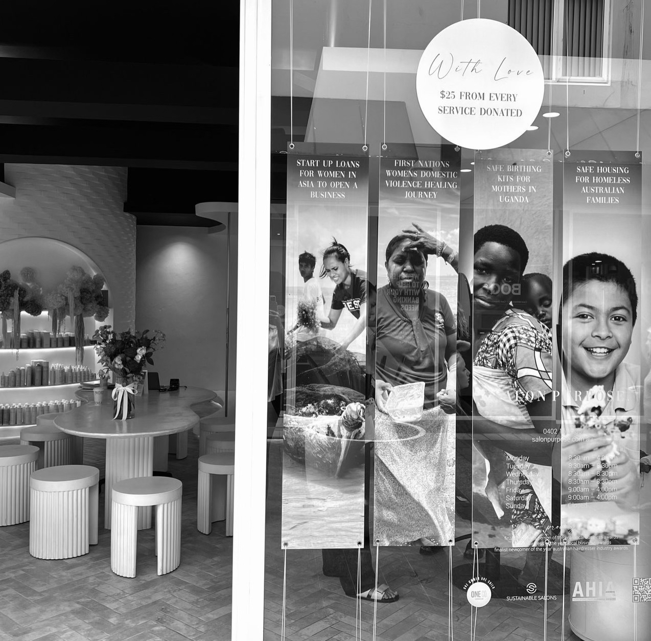 Salon Purpose 'With Love' Campaign window display in black and white